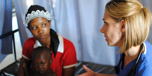 Stephanie Van Dyke '99 with an Engeye Clinic patient