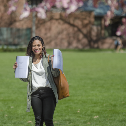student turning in thesis