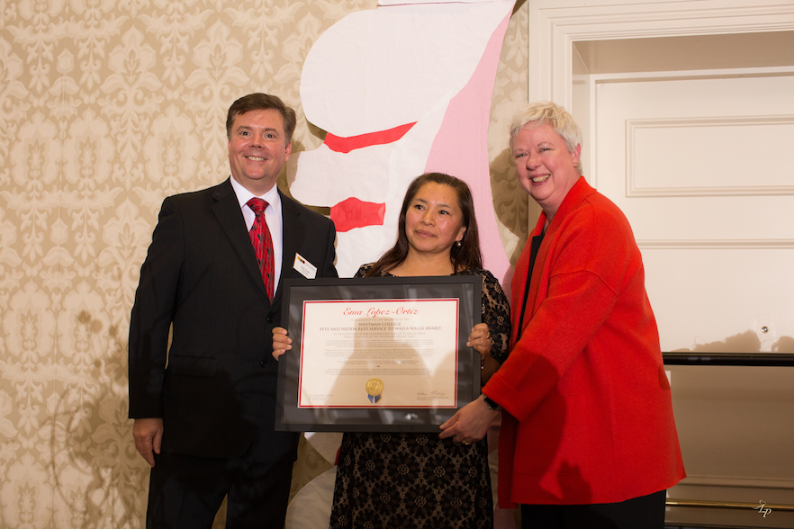 Custodian Ema Lopez-Ortiz (center), flanked by Walla Walla Valley Chamber of Commerce President Brian Duvall and Whitman President Kathleen Murray. Photo courtesy of Laurie’s Photography. 