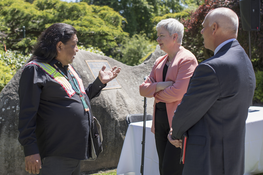 Confederated Tribes of the Umatilla Indian Reservation (CTUIR) Board Member Thomas Morning Owl (left), Whitman College President Kathleen Murray and Chair of the Whitman Board of Trustees Brad McMurchie '84 confer about the memorandum of understanding on May 19.