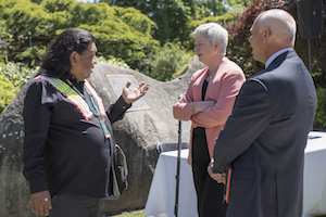 Confederated Tribes of the Umatilla Indian Reservation (CTUIR) Board Member Thomas Morning Owl (left), Whitman College President Kathleen Murray and Chair of the Whitman Board of Trustees Brad McMurchie '84 confer about the memorandum of understanding on May 19. 