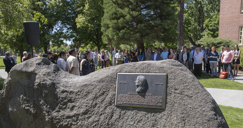 Members of the CTUIR and Whitman communities witness the historic event in front of Treaty Rock.