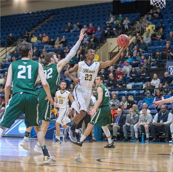 Tim Howell driving toward the basket