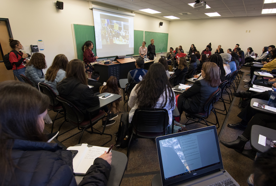 Left to right at the board: Reed College students Tiffany Chang, Mia Bonilla (obscured), Serena Morales and Alex Boyd share their experiences with resistance at their school during the workshop they led, "Boycotts, Protests and Sit-ins! Oh My! A Comprehensive Guide to On Campus Dissent." Reed became a sanctuary school and wrote an anti-racism statement partly because of their efforts. "Take advantage of media—document everything. This leaves proof you're actually making a change, and you can leave something behind for the people who come afterward," Bonilla said.