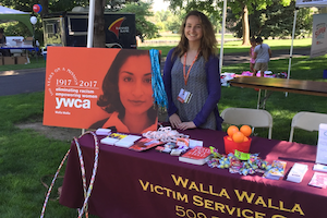 Summer intern at booth