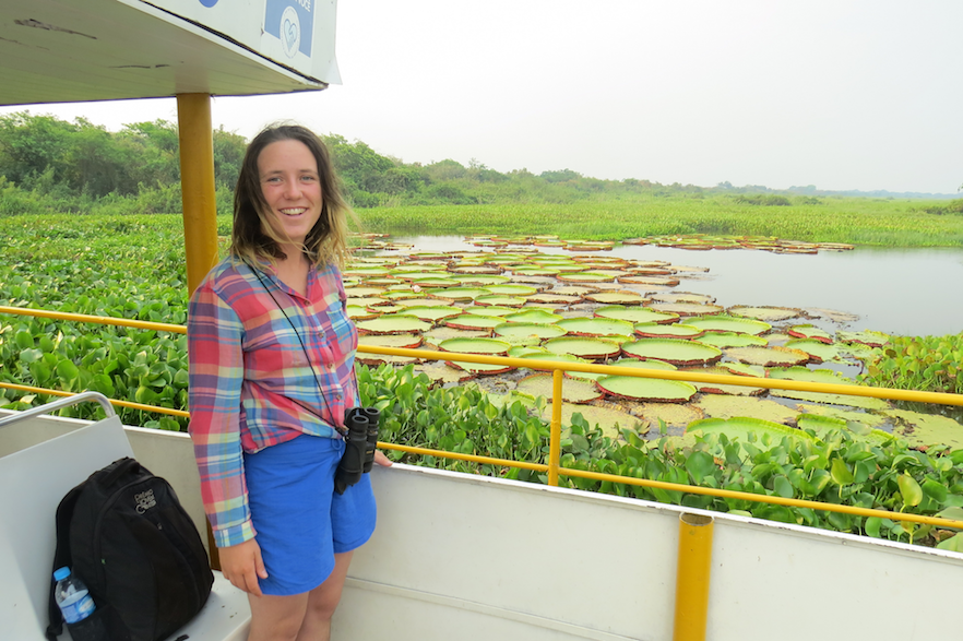 Nina Finley views Victorian water lilies from aboard a boat in Brazil's Paraguay River, the primary waterway of the world's largest inland wetland, the Pantanal, in September 2017. 