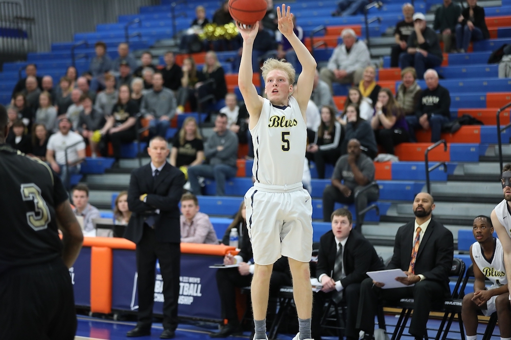 Basketball player goes up for a shot