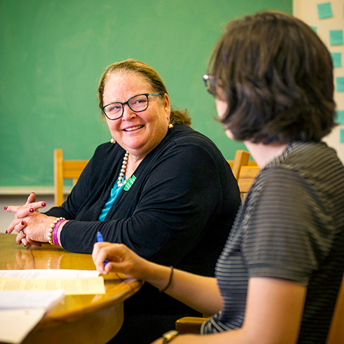 Chief Justice Mary Fairhurst talks with a student during a class at Whitman College Sept. 10, 2018.