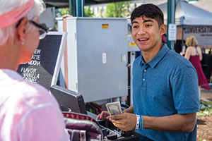 Miguel Baza sells coffee at the Walla Walla farmers market.