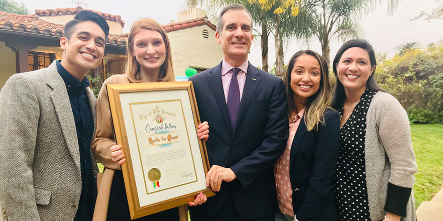 Becky Avila stands with the mayor of L.A.