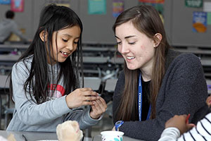 Kimberly Taylor works with an elementary student