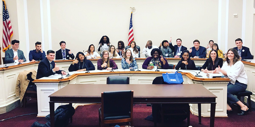 Members of Eye to Eye pose or a group photo in Washington, D.C.