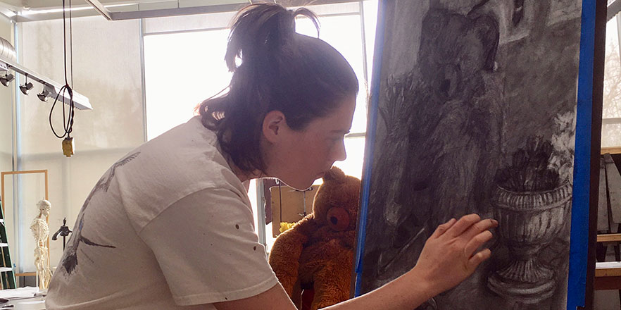 Sylvie Corwin works on a drawing in Fouts Center for Visual Arts.