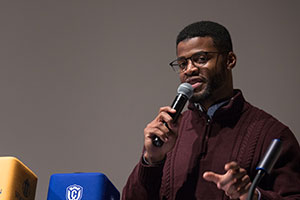 A student speaks during a Power and Privilege session.