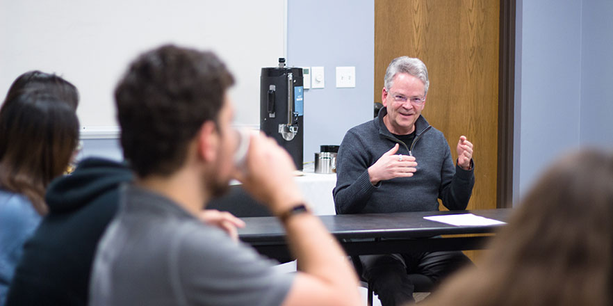 Tom Davis talks to students during a presentation in February 2020.