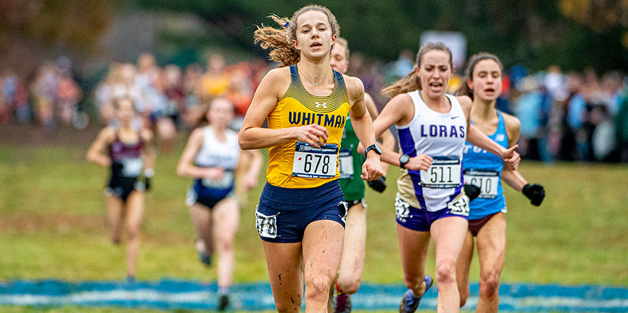 Whitney Rich competes in cross country championships.