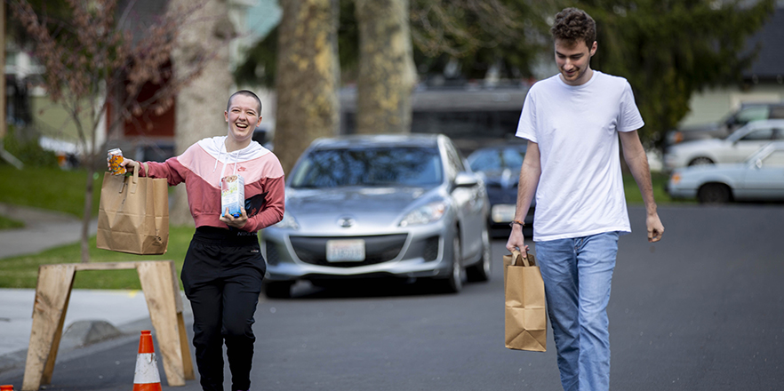 Students pick up sack lunches at Cleveland Commons