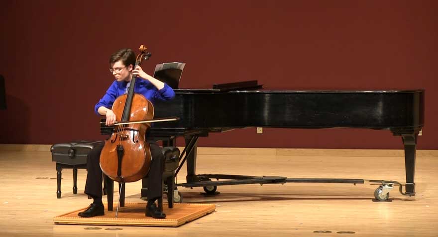 Liam Dubay playing the cello