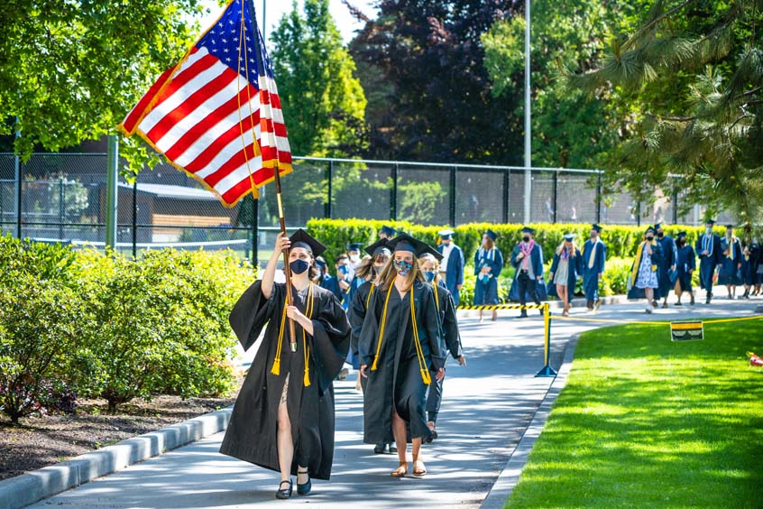 Graduates processing into Commencement