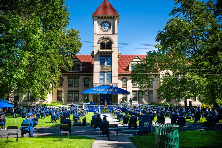 Graduates in front of Memorial Building