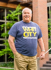 Jim Dow smiling outside Reid 