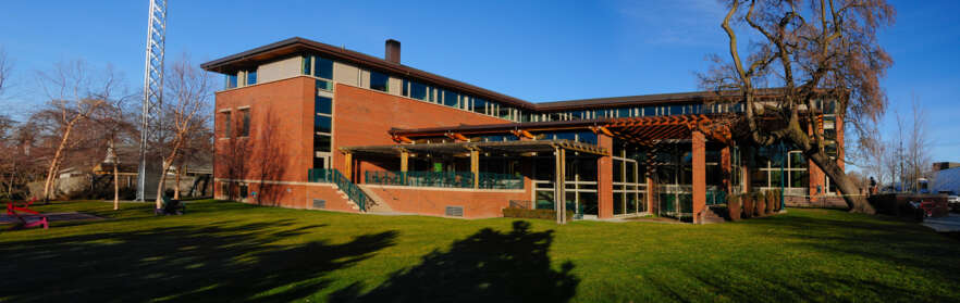 Photo of Reid Campus Center with bright blue sky in the background