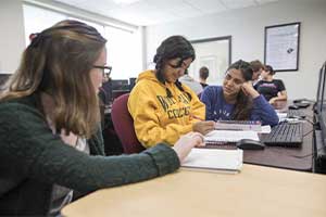 Computer Science students discussing a project.