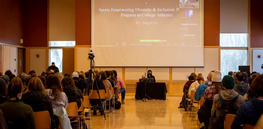 Angel Le speaks to students in the Young Ballroom.
