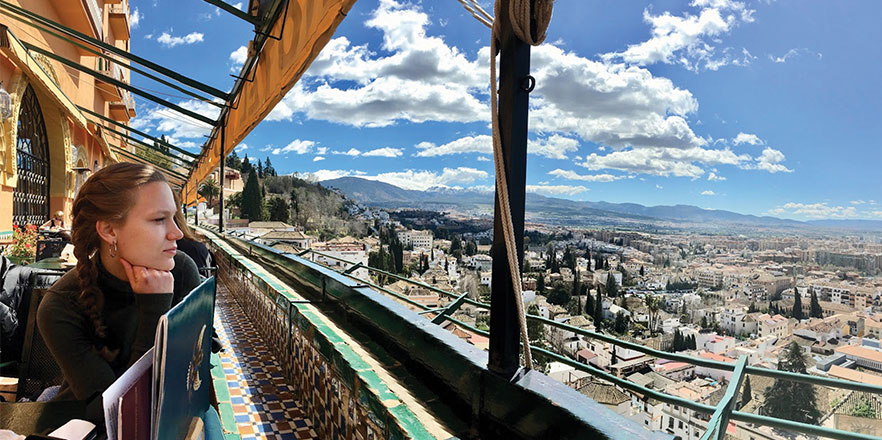 A Whitman student looking off into the horizon in Spain.