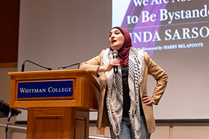 Image of Linda Sarsour presenting in Reid Campus Center.