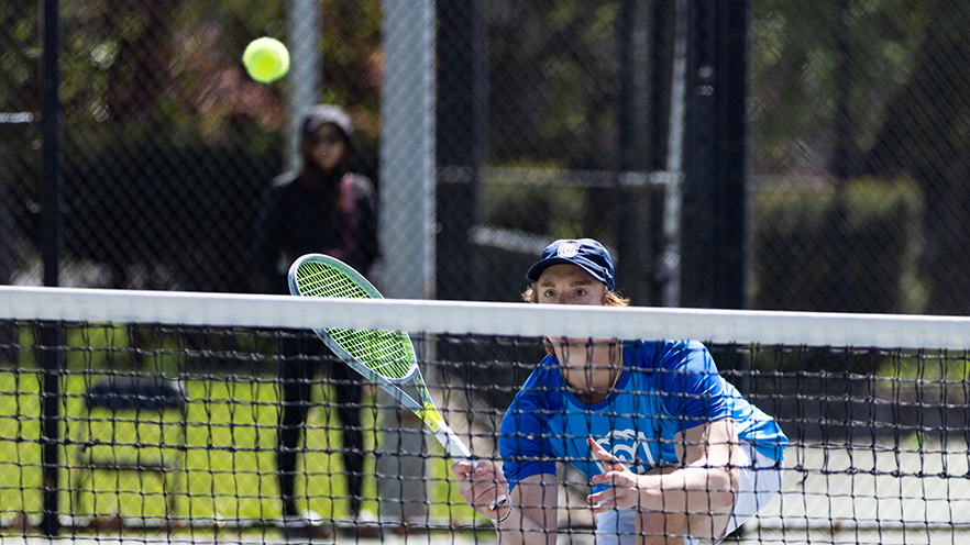 Artem Manov prepping for a soft shot over the net.