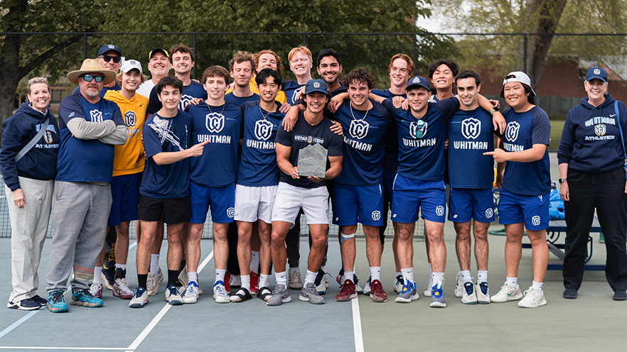 2024-25 Whitman Men's Tennis Team holding the Northwest Conference Tennis Championship trophy