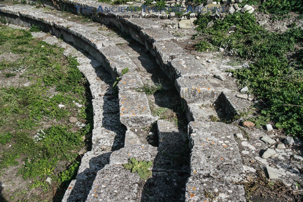 Detail of stone theatre seats with one of the eight stone stairways (kilmakes). Photo: T Hines 2019.